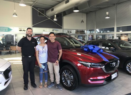 Mar taking delivery of a Mazda CX5